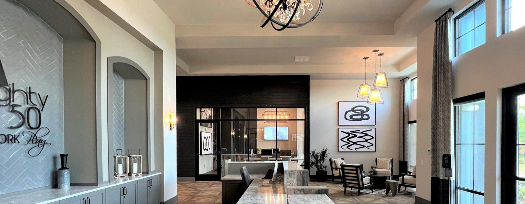 a room with a bar and chairs