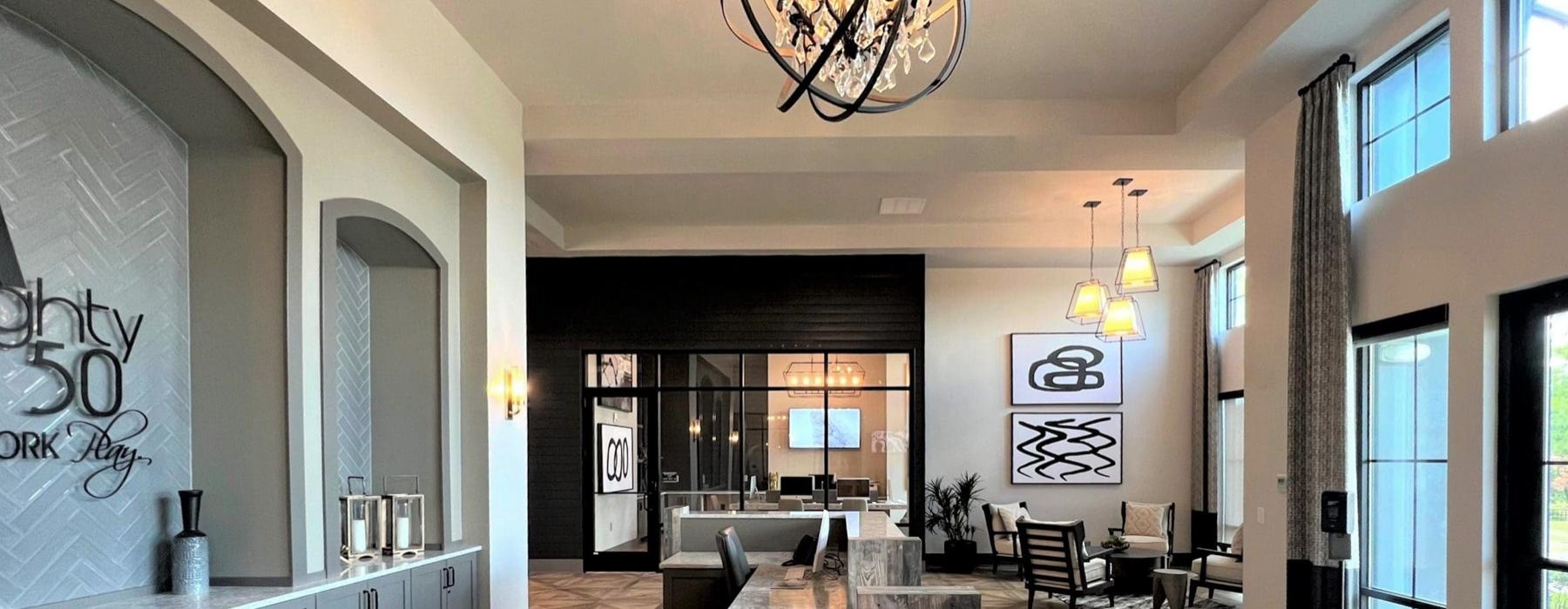 a room with a bar and chairs